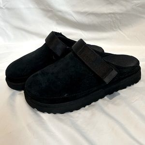 Black Uggs “Goldenstar” clogs. Size 8.5. Strap can be worn on or off the heel.